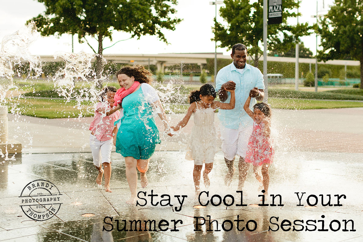 family of five running through sprinklers for a summer photo session in plano tx