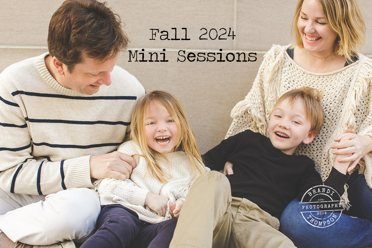 family of four close up, laughing and playing together against a wall downtown dallas fall mini sessions